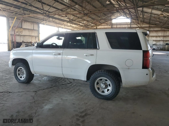 2019 Chevrolet Tahoe Commercial with VIN 1GNSKFEC4KR128319, listed as a Copart auction lot 83878674 with 129,751 mi miles and Clean Title. Bid and sale history available at carsss.com. Image 2.