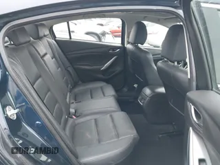 2016 Mazda 6 i Touring z VIN JM1GJ1V50G1401865, wystawiony jako IAAI lot #42334286 z przebiegiem 148 593 mil mil oraz . Historia ofert i sprzedaży dostępna na DreamBid. Obrazek 8.