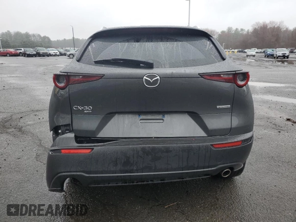 2022 Mazda CX-30 S Premium with VIN 3MVDMBDLXNM445466, listed as a Copart auction lot 51820105 with 65,417 mi miles and Salvage title. Bid and sale history available at DreamBid. Image 6.