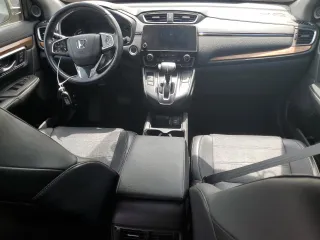2018 Honda CR-V Touring z VIN 7FARW2H95JE012947, wystawiony jako Copart lot #64779925 z przebiegiem 20 561 mil mil oraz Szkoda całkowita • Salvage title. Historia ofert i sprzedaży dostępna na DreamBid. Obrazek 8.