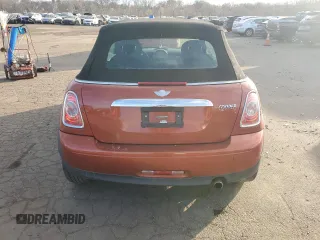 2012 MINI Convertible z VIN WMWZN3C57CT265368, wystawiony jako Copart lot #87100414 z przebiegiem 124 102 mil mil oraz Szkoda całkowita • Salvage title. Historia ofert i sprzedaży dostępna na DreamBid. Obrazek 6.