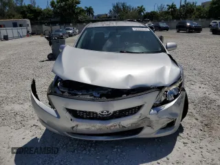2009 Toyota Corolla with VIN JTDBL40E299062723, listed as a Copart auction lot 52899515 with 183,666 mi miles and Salvage Title. Bid and sale history available at carsss.com. Image 5.