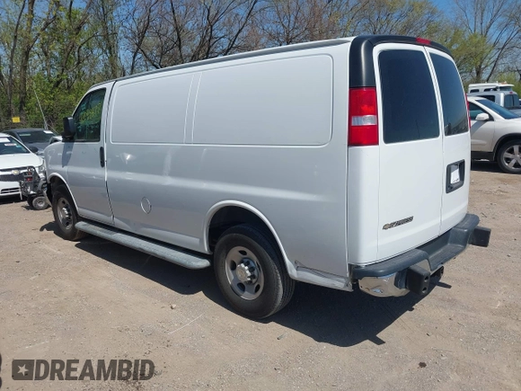 2020 Chevrolet Express Cargo Van with VIN 1GCWGAFG9L1213396, listed as a IAAI auction lot 42049377 with 122,571 mi miles. Bid and sale history available at carsss.com. Image 3.