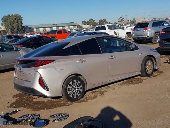 2021 Toyota Prius Prime LE with VIN JTDKAMFP1M3178179, listed as a IAAI auction lot 41233411 with 83,035 mi miles. Bid and sale history available at carsss.com. Image 4.