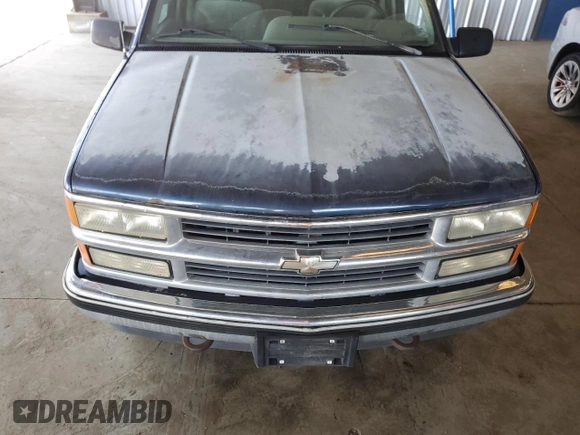 1995 Chevrolet Suburban z VIN 1GNFK16K9SJ333918, wystawiony jako Copart lot #46665205 z przebiegiem 208 395 mil mil oraz Czysty tytuł • Clean title. Historia ofert i sprzedaży dostępna na DreamBid. Obrazek 12.