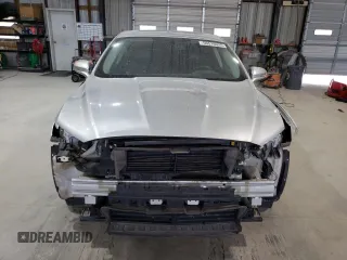 2016 Ford Fusion Titanium Hybrid with VIN 3FA6P0RUXGR355351, listed as a Copart auction lot 56516025 with 117,964 mi miles and Salvage title. Bid and sale history available at DreamBid. Image 5.