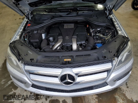 2013 Mercedes-Benz GL 450 z VIN 4JGDF7CE5DA249552, wystawiony jako Copart lot #52590995 z przebiegiem 128 518 mil mil oraz Szkoda całkowita • Salvage title. Historia ofert i sprzedaży dostępna na DreamBid. Obrazek 12.