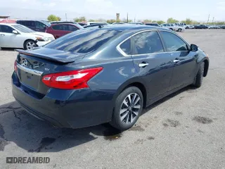 2016 Nissan Altima 2.5 S with VIN 1N4AL3AP8GC133418, listed as a IAAI auction lot 41932707 with 104,830 mi miles. Bid and sale history available at carsss.com. Image 4.