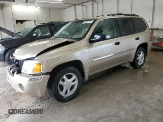 2006 GMC Envoy SLE with VIN 1GKDT13S662304673, listed as a Copart auction lot 50994265 with 221,069 mi miles and Salvage Title. Bid and sale history available at carsss.com. Image 1.