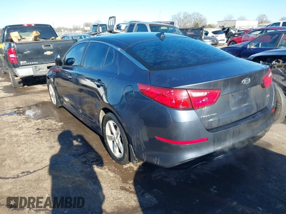 2015 Kia Optima LX with VIN KNAGM4A72F5543977, listed as a IAAI auction lot 41328035 with 153,805 mi miles and . Bid and sale history available at DreamBid. Image 3.