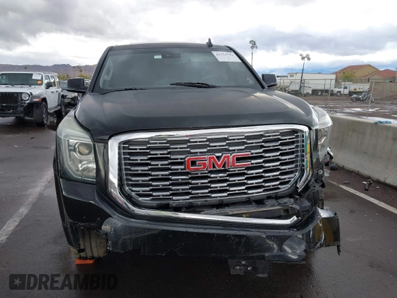 2019 GMC Yukon XL SLT with VIN 1GKS1GKC7KR155668, listed as a IAAI auction lot 41751792 with 163,537 mi miles. Bid and sale history available at carsss.com. Image 13.