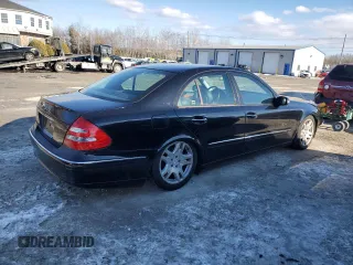 2003 Mercedes-Benz E-Class 5.0L with VIN WDBUF70J43A123959, listed as a Copart auction lot 45032875 with 136,922 mi miles and Non Repairable. Bid and sale history available at carsss.com. Image 3.