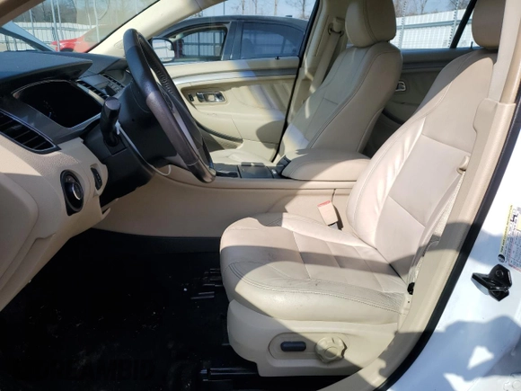 2016 Ford Taurus SEL with VIN 1FAHP2E96GG128073, listed as a Copart auction lot 44019985 with 104,090 mi miles and Salvage Title. Bid and sale history available at DreamBid. Image 7.