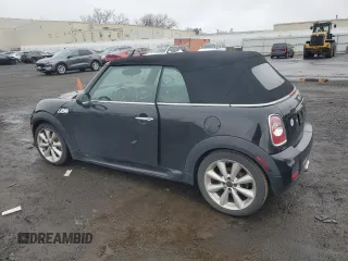 2015 MINI Convertible S with VIN WMWZP3C51FT708886, listed as a Copart auction lot 46860925 with 105,437 mi miles and Clean title. Bid and sale history available at DreamBid. Image 2.