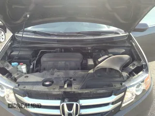 2014 Honda Odyssey EX-L with VIN 5FNRL5H64EB037646, listed as a IAAI auction lot 41786768 with 116,491 mi miles and . Bid and sale history available at carsss.com. Image 10.