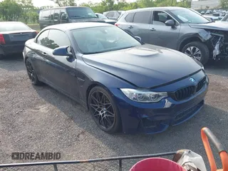 2015 BMW M4 with VIN WBS3U9C50FP967987, listed as a IAAI auction lot 42382479 with 34,384 mi miles and . Bid and sale history available at DreamBid. Image 1.