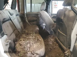 2019 Jeep Wrangler Unlimited Sport S z VIN 1C4HJXDN7KW644917, wystawiony jako Copart lot #54204085 z przebiegiem Nie podano mil oraz Szkoda całkowita • Salvage title. Historia ofert i sprzedaży dostępna na DreamBid. Obrazek 11.