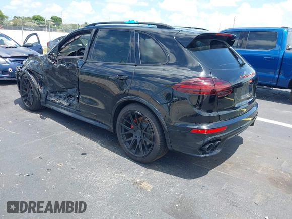 2016 Porsche Cayenne GTS z VIN WP1AD2A25GLA70430, wystawiony jako IAAI lot #42547008 z przebiegiem 108 374 mil mil oraz . Historia ofert i sprzedaży dostępna na DreamBid. Obrazek 3.