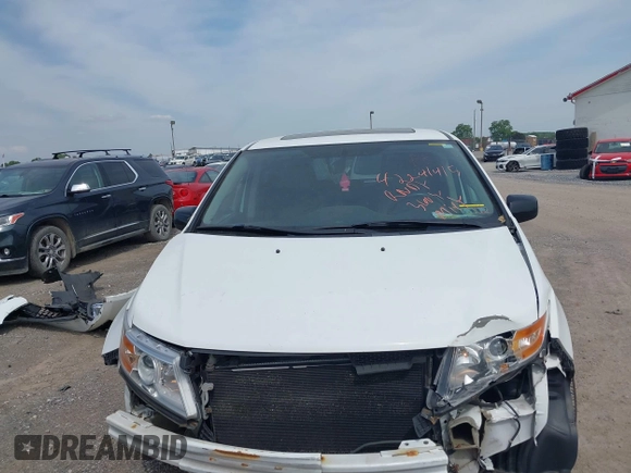 2012 Honda Odyssey EX-L with VIN 5FNRL5H62CB059481, listed as a IAAI auction lot 42241415 with 135,244 mi miles and . Bid and sale history available at DreamBid. Image 12.