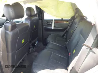 2007 GMC Envoy Denali with VIN 1GKES63MX72103849, listed as a IAAI auction lot 41904190 with 237,261 mi miles. Bid and sale history available at carsss.com. Image 8.