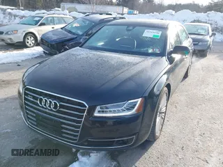 2015 Audi A8 L 4.0T with VIN WAU32AFD0FN035282, listed as a IAAI auction lot 41515136 with 76,518 mi miles. Bid and sale history available at carsss.com. Image 2.