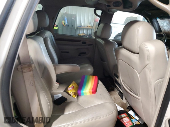 2004 Cadillac Escalade z VIN 1GYEK63N94R252528, wystawiony jako Copart lot #54253175 z przebiegiem Nie podano mil oraz Szkoda całkowita • Salvage title. Historia ofert i sprzedaży dostępna na DreamBid. Obrazek 11.