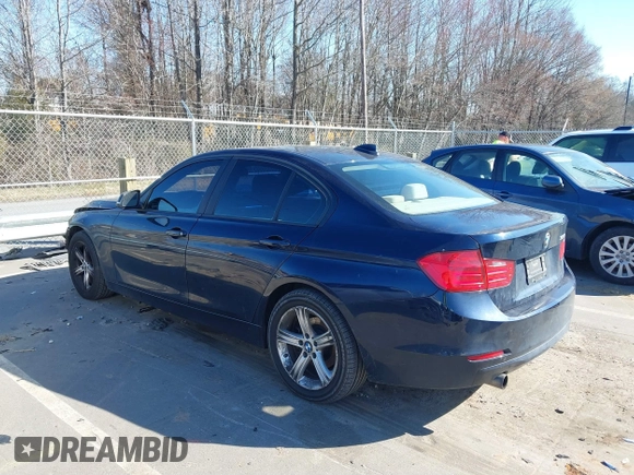 2013 BMW 3 Series 320i with VIN WBA3B1C5XDF461582, listed as a IAAI auction lot 41644855 with 159,363 mi miles. Bid and sale history available at carsss.com. Image 3.