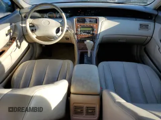 2001 Toyota Avalon XL z VIN 4T1BF28B81U162506, wystawiony jako Copart lot #52031805 z przebiegiem 212 437 mil mil oraz Szkody całkowita. Historia ofert i sprzedaży dostępna na DreamBid. Obrazek 8.