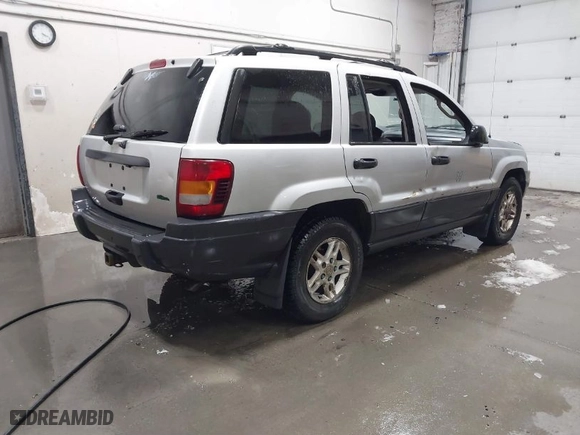 2004 Jeep Grand Cherokee Laredo with VIN 1J4GW48S94C125054, listed as a IAAI auction lot 41788785 with 322,651 mi miles. Bid and sale history available at carsss.com. Image 4.