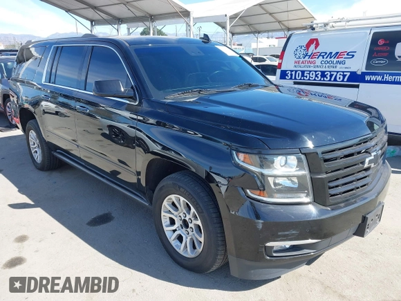 2019 Chevrolet Suburban LT with VIN 1GNSCJKCXKR332739, listed as a IAAI auction lot 41636530 with 104,997 mi miles and . Bid and sale history available at DreamBid. Image 1.