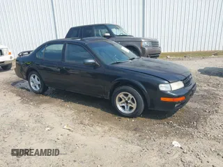 1997 Nissan Maxima GXE z VIN JN1CA21D4VM517036, wystawiony jako IAAI lot #42409047 z przebiegiem 245 529 mil mil oraz . Historia ofert i sprzedaży dostępna na DreamBid. Obrazek 1.