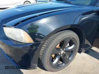 2012 Dodge Charger SXT with VIN 2C3CDXHG2CH258844, listed as a IAAI auction lot 42025908 with 214,529 mi miles. Bid and sale history available at carsss.com. Image 17.