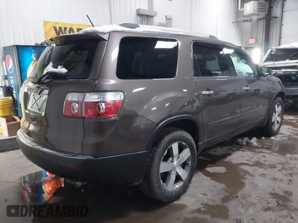 2011 GMC Acadia SLT1 with VIN 1GKKRREDXBJ331099, listed as a IAAI auction lot 41950066 with 128,067 mi miles. Bid and sale history available at carsss.com. Image 4.