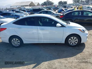2017 Hyundai Accent SE z VIN KMHCT4AE1HU339968, wystawiony jako IAAI lot #41814900 z przebiegiem 97 332 mil mil oraz . Historia ofert i sprzedaży dostępna na DreamBid. Obrazek 13.