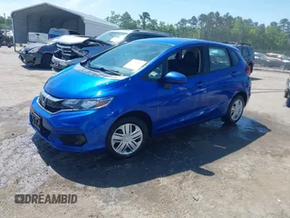 2020 Honda Fit LX z VIN 3HGGK5H43LM703494, wystawiony jako IAAI lot #42308518 z przebiegiem 67 452 mil mil oraz . Historia ofert i sprzedaży dostępna na DreamBid. Obrazek 2.