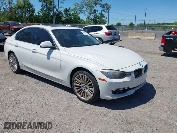 2013 BMW 3 Series 328i xDrive with VIN WBA3B5C51DJ599144, listed as a IAAI auction lot 42059260 with 84,153 mi miles. Bid and sale history available at carsss.com. Image 1.