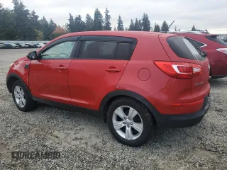 2012 Kia Sportage LX with VIN KNDPBCA24C7229772, listed as a Copart auction lot 75685064 with 174,250 mi miles and Salvage Title. Bid and sale history available at DreamBid. Image 2.