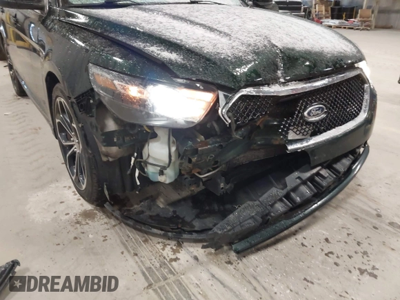2013 Ford Taurus SHO z VIN 1FAHP2KT8DG142620, wystawiony jako IAAI lot #41800583 z przebiegiem 175 812 mil mil oraz . Historia ofert i sprzedaży dostępna na DreamBid. Obrazek 6.