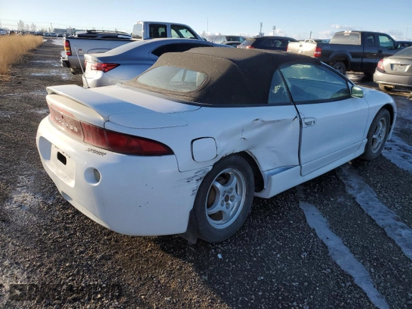 1999 Mitsubishi Eclipse GS with VIN 4A3AX35G2XE062629, listed as a Copart auction lot 87689125 with 223,210 mi miles and Salvage Title. Bid and sale history available at carsss.com. Image 4.
