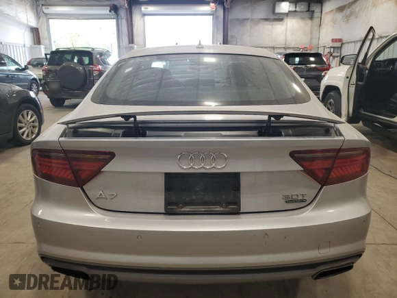 2016 Audi A7 3.0 Prestige with VIN WAU2GAFC7GN104801, listed as a Copart auction lot 64997833 with 74,427 mi miles. Bid and sale history available at carsss.com. Image 6.