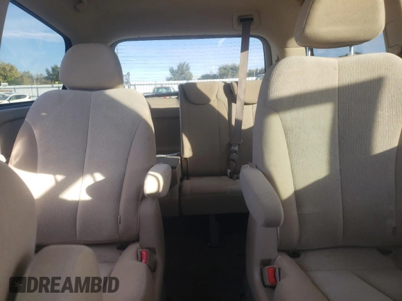 2011 Kia Sedona LX with VIN KNDMG4C74B6370803, listed as a Copart auction lot 77228344 with 142,394 mi miles and Salvage Title. Bid and sale history available at DreamBid. Image 10.
