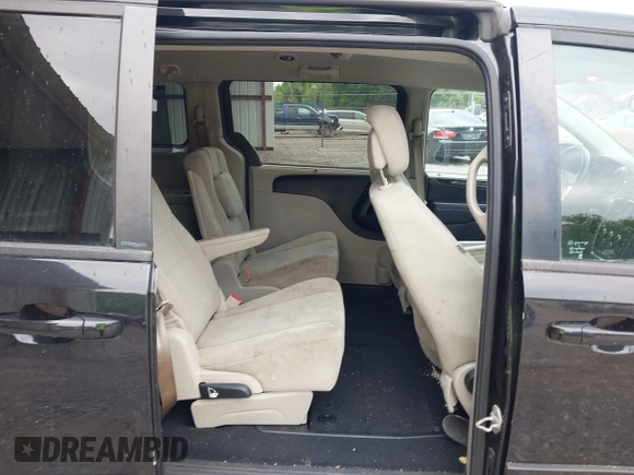 2013 Dodge Grand Caravan SXT with VIN 2C4RDGCG9DR599814, listed as a IAAI auction lot 42168424 with 173,413 mi miles and . Bid and sale history available at DreamBid. Image 8.