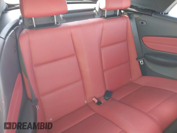 2011 BMW 1 Series 128i with VIN WBAUL7C55BVM81049, listed as a IAAI auction lot 41892811 with 50,659 mi miles and . Bid and sale history available at carsss.com. Image 8.