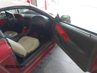 2003 Ford Mustang Deluxe z VIN 1FAFP44403F407592, wystawiony jako IAAI lot #42409746 z przebiegiem 211 269 mil mil oraz . Historia ofert i sprzedaży dostępna na DreamBid. Obrazek 5.