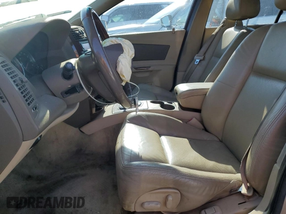 2006 Cadillac CTS with VIN 1G6DM57T660189008, listed as a Copart auction lot 57402805 with 159,606 mi miles and Salvage title. Bid and sale history available at DreamBid. Image 7.
