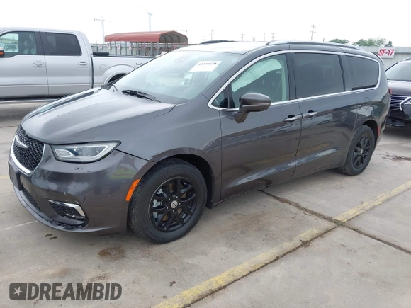 2021 Chrysler Pacifica Touring L z VIN 2C4RC1BG3MR574439, wystawiony jako IAAI lot #42190695 z przebiegiem 104 188 mil mil oraz . Historia ofert i sprzedaży dostępna na DreamBid. Obrazek 18.