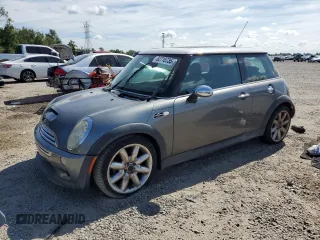 2006 MINI Hardtop S with VIN WMWRE335X6TJ40269, listed as a Copart auction lot 62719735 with 96,215 mi miles and Salvage title. Bid and sale history available at DreamBid. Image 1.