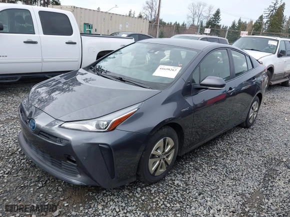 2021 Toyota Prius L Eco with VIN JTDKAMFU2M3143138, listed as a IAAI auction lot 41658263 with 102,718 mi miles. Bid and sale history available at carsss.com. Image 14.