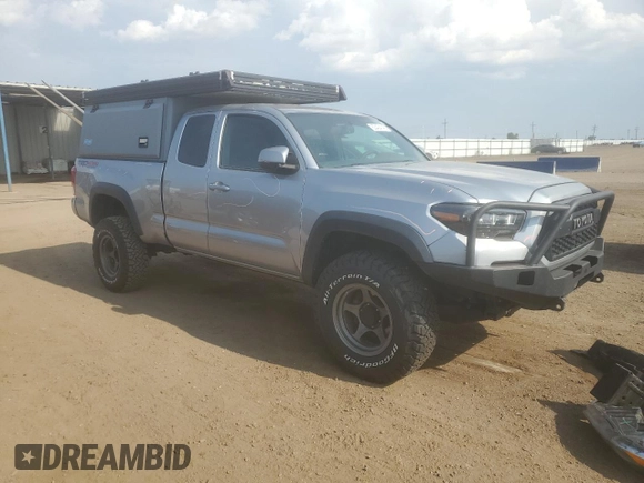 2017 Toyota Tacoma SR5 with VIN 5TFSZ5AN4HX047041, listed as a Copart auction lot 63424145 with 191,335 mi miles and Salvage title. Bid and sale history available at DreamBid. Image 4.