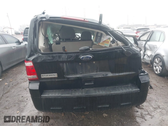 2012 Ford Escape XLS z VIN 1FMCU9C73CKB34021, wystawiony jako IAAI lot #40971529 z przebiegiem Nie podano mil oraz . Historia ofert i sprzedaży dostępna na DreamBid. Obrazek 15.
